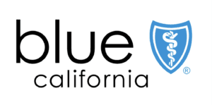 Logo of Blue California, featuring the word "blue" in bold black and a blue shield with a caduceus.