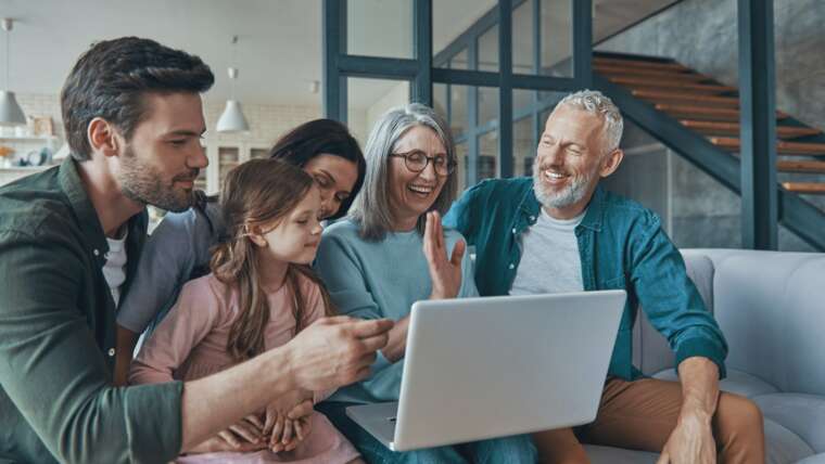 family using a laptop